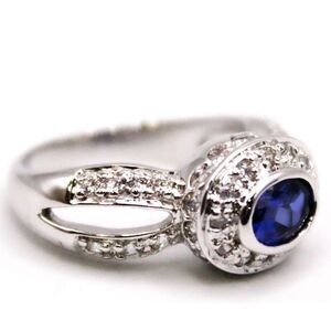 Gorgeous Sapphire (tested) Ring with a clear crystal halo, size 7